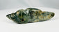 Ancient Pre-Columbian pendant carved from greenstone with symbolic animal form