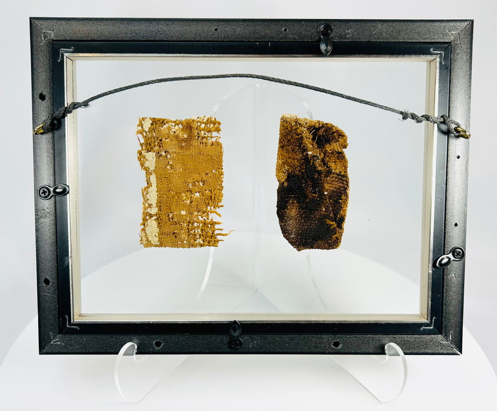 Ancient Egyptian burial fragments with classic profile figure and pigment traces