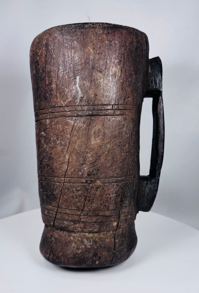 Primitive carved Himalayan storage container associated with traditional rural household use