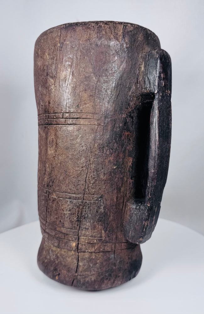 Himalayan ethnographic wooden storage vessel with incised linear decoration and dark patina