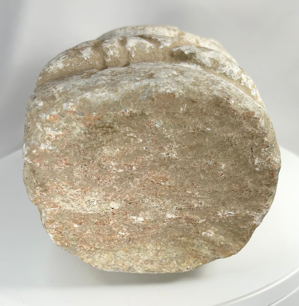 Early Bronze Age limestone sculpture with abstract form and archaeological patina