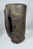 Traditional Tibetan carved wooden butter vessel with shrinkage cracks and hand-worked surface