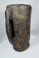 Traditional Tibetan carved wooden butter vessel with shrinkage cracks and hand-worked surface