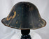 Antique Japanese lacquered helmet with segmented dome and surviving interior red lacquer