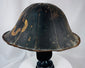 Antique Japanese lacquered helmet with segmented dome and surviving interior red lacquer