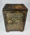 Antique cast iron still bank modeled as a safe with LIBERTAS SAFE lettering