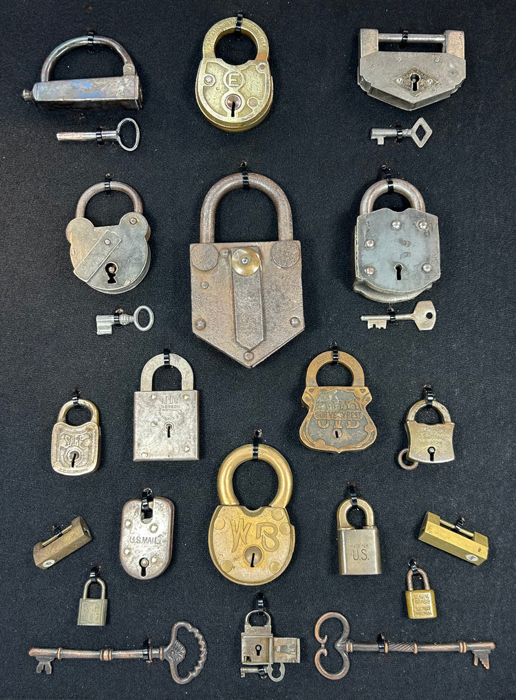 Framed assortment of antique locks including U.S. Mail and marked examples