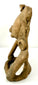 Pre-Columbian terracotta sculpture displaying a broad rounded face, prominent nose, sculpted lips, and large circular ear ornaments.