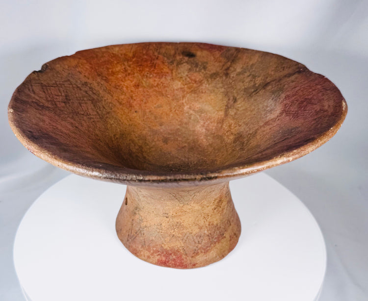 Archaeological pottery vessel from ancient Mesoamerica featuring a sculptural pedestal design
