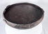 Pre-Columbian earthenware vessel featuring a hemispherical form and fire-clouded patina