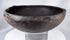 Hand-formed ancient pottery bowl with rim projections and mineralized archaeological surface