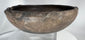 Ancient terracotta vessel displaying raised rim nodes and authentic age-related weathering