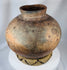 Large ethnographic pottery vessel from Timor-Leste with spiral ornamentation and aged earthenware finish
