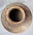 Traditional Indonesian island pottery jar with painted shoulder decoration and natural firing variations