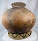 Ethnographic Timorese pottery vessel with globular body and traditional painted geometric motifs