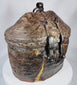 Traditional Tibetan travel basket constructed from woven reed, hide, and iron fittings