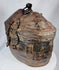 Handwoven Himalayan travel container with aged leather covering and rich patina