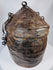 Rare woven reed and hide travel basket displaying traditional indigenous craftsmanship