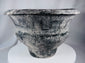 Ban Chiang-style ceramic pot with broad rim, crosshatched texture, and aged surface treatment