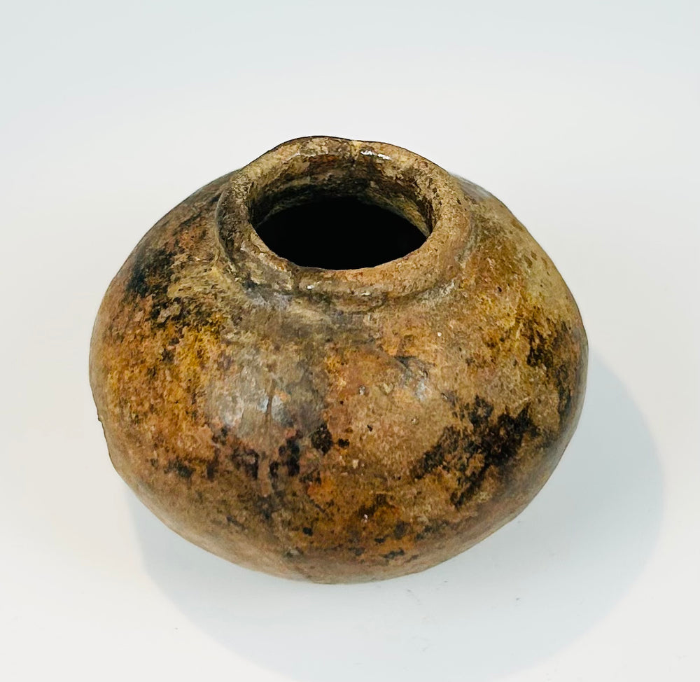 Pre-Columbian small globular vessel with narrow opening and natural patina