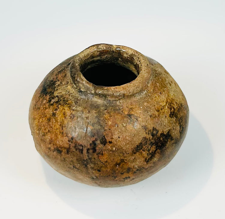 Pre-Columbian small globular vessel with narrow opening and natural patina