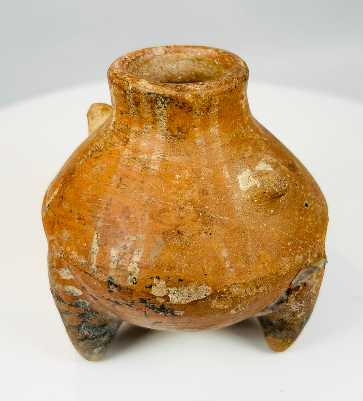 Pre-Columbian effigy tripod vessel with applied facial features and textured surface decoration