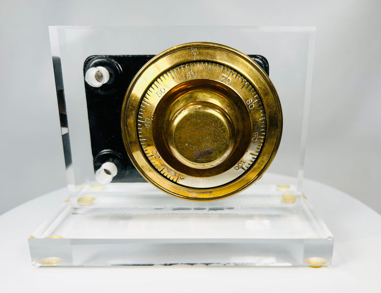 Vintage American safe lock internal mechanism mounted on display stand