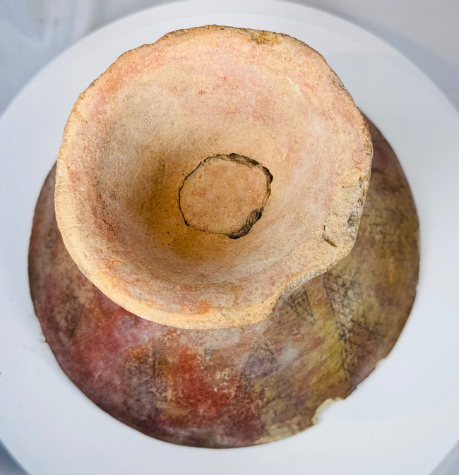 Pre-Columbian ceremonial serving bowl with broad flared form and geometric painted interior decoration.