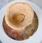Pre-Columbian ceremonial serving bowl with broad flared form and geometric painted interior decoration.