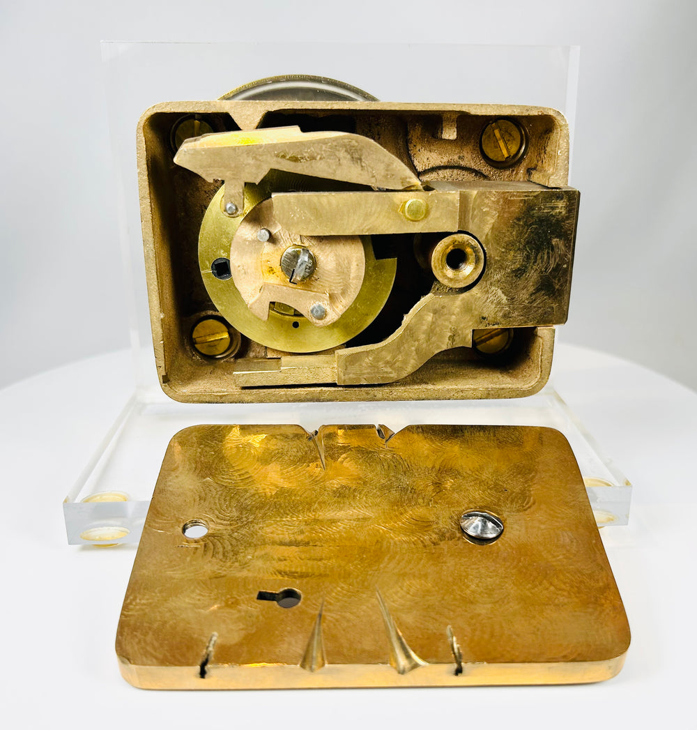 Collectible antique safe lock with internal mechanism exposed for display