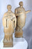 Hand-carved saintly figures from Continental Europe with decorative vestments and devotional character.