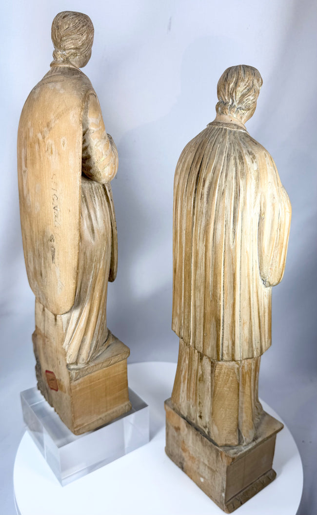 European ecclesiastical carvings with detailed craftsmanship, aged patina, and sculptural presence.