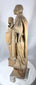 Antique European saint sculptures carved from hardwood with visible tool marks and natural wear.