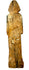 Antique hand-carved wooden figurine back view with green pigment traces and wood grain
