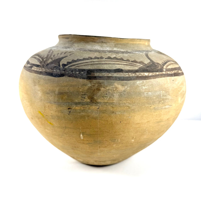 Full side view of bulbous Huastec pottery with surface wear