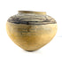 Full side view of bulbous Huastec pottery with surface wear