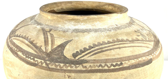Antique Mexican terracotta olla featuring a wide circular opening, gently flared rim, and rounded storage vessel form.
