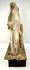 Rear view of wooden Santo figures revealing deep timber cracks and flaking paint layers