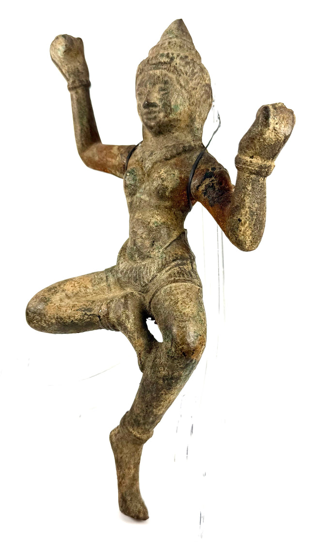 Three-quarter view of weathered bronze deity highlighting ornate headpiece