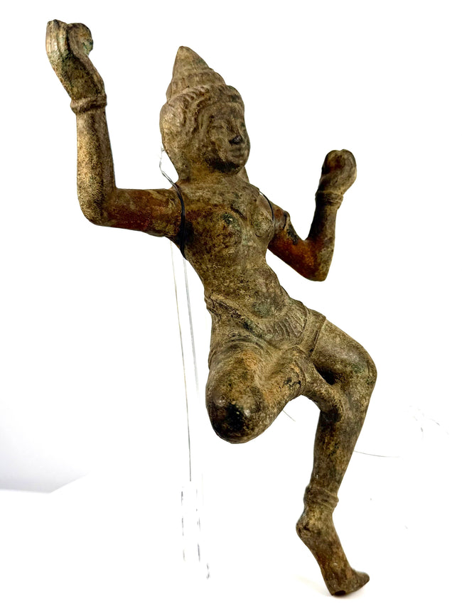 Angled view of bronze figure emphasizing twisted torso posture