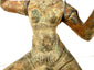 Close-up of textured bronze torso with oxidation and support wire