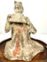Ancient Chinese terracotta figurine seated woman playing pan flute detail