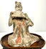 Frontal Tang Dynasty terracotta female musician figure with faded paint