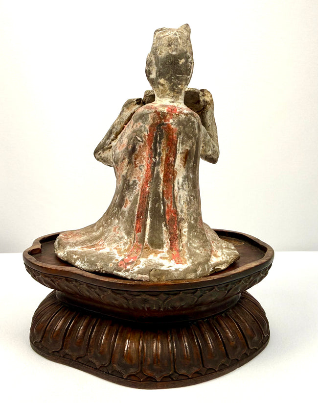 Back view of Tang Dynasty terracotta female musician on lotus pedestal