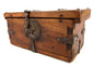 Side view of elmwood strongbox showing heavy iron bracing, strap hinges, and decorative circular lock escutcheon