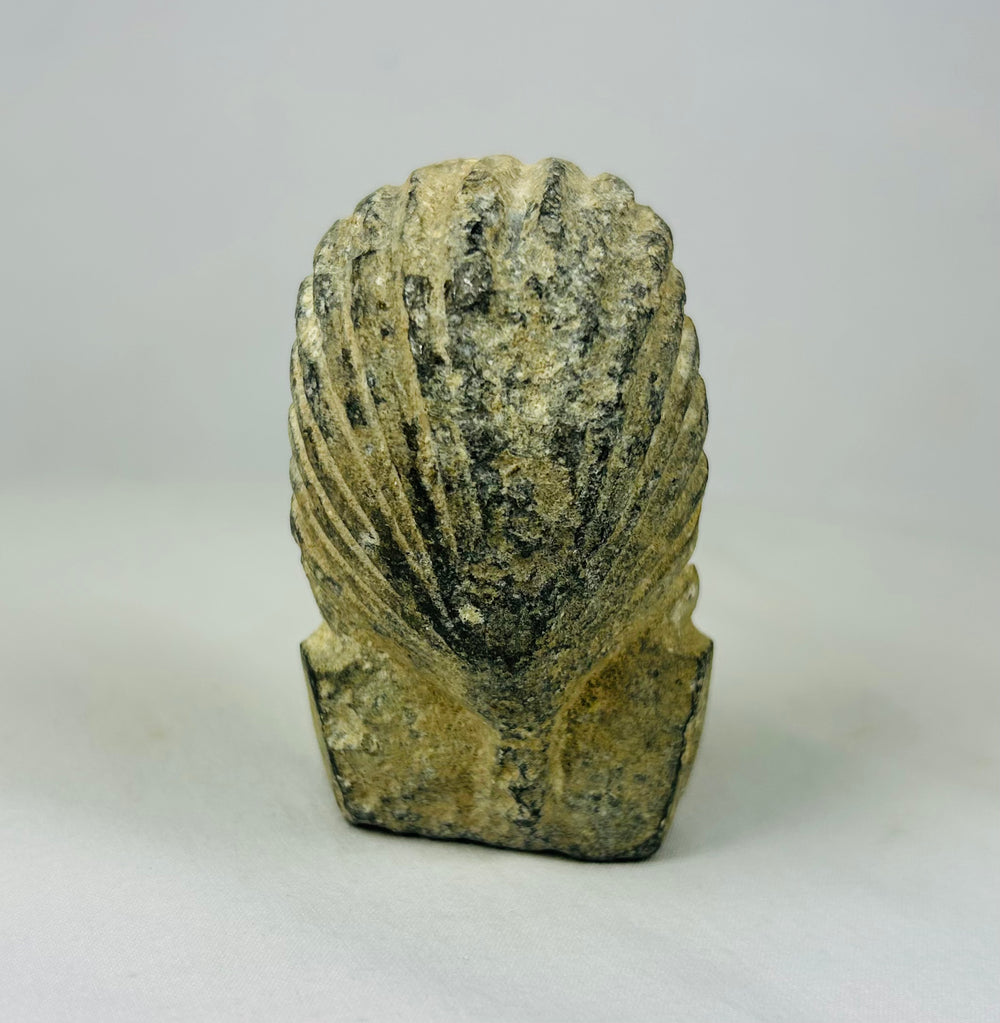 Limestone sculpted head of an Egyptian pharaoh, featuring nemes headdress and uraeus detail, Grand Tour collectible from the 19th–early 20th century on a neutral background.