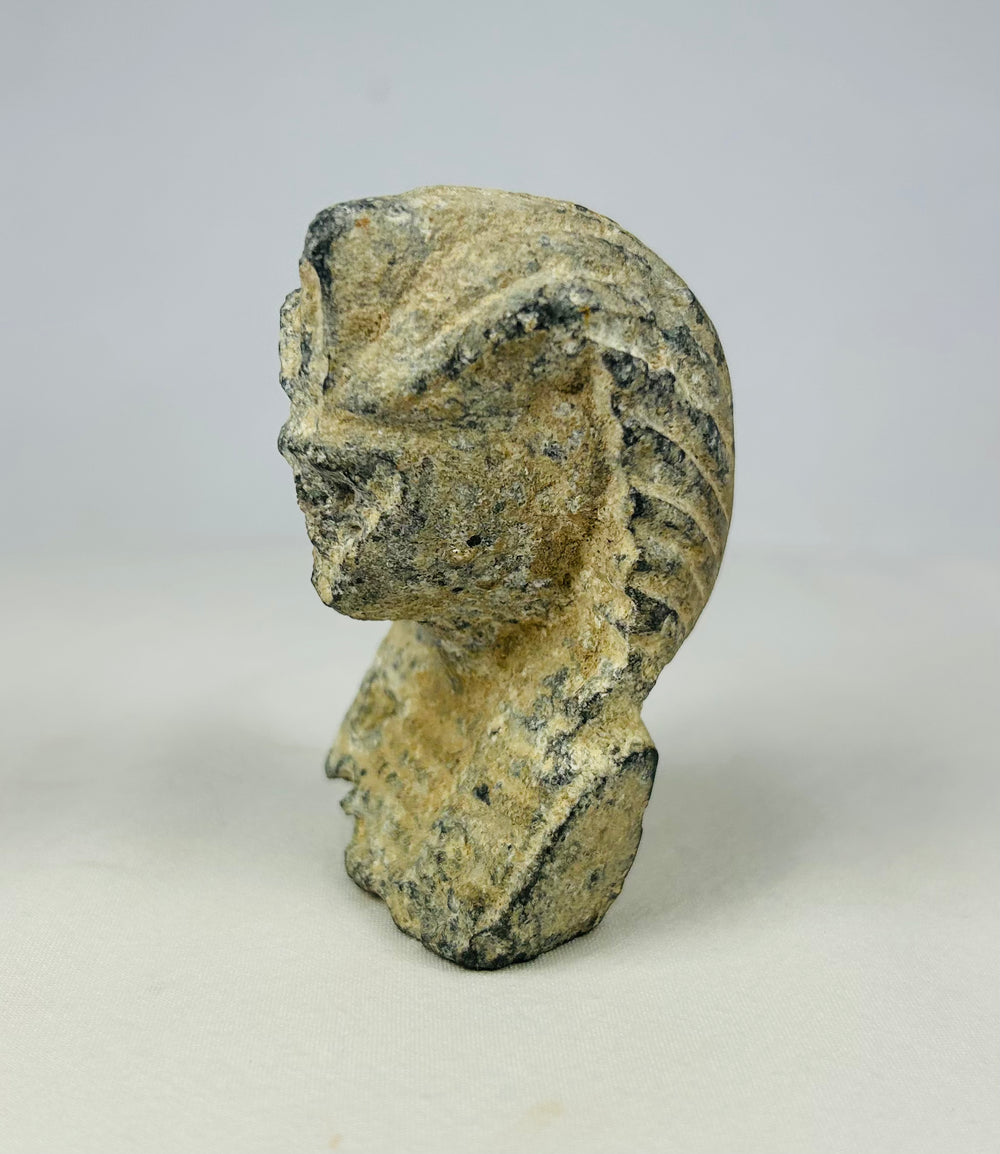 Carved limestone Egyptian pharaoh head with nemes headdress and uraeus serpent, European Grand Tour piece from circa 1800–1920, shown on a neutral backdrop.
