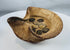 Ancient Punic-Roman terracotta oil lamp displaying folded rim construction and bronze coins