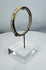 Roman Imperial glass bracelet displaying centuries of burial patina and mineral accretions.