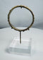 Ancient Mediterranean glass bracelet from the Roman Imperial period with archaeological deposits.